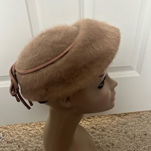 Vintage tan hat by Eddi with bow